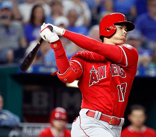 Shohei Ohtani of the Angels swings during the seventh inning of Thursday night's game against the Royals at Kauffman Stadium.