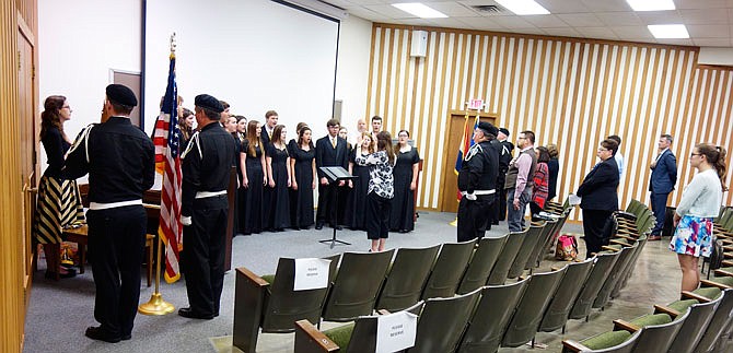 Members of the Missouri Department of Corrections' Color Guard present the colors Friday afternoon. The Fulton High School Chamber Singers also performed at the Callaway County Crime Victims' Rights Week Community Ceremony at William Woods University.