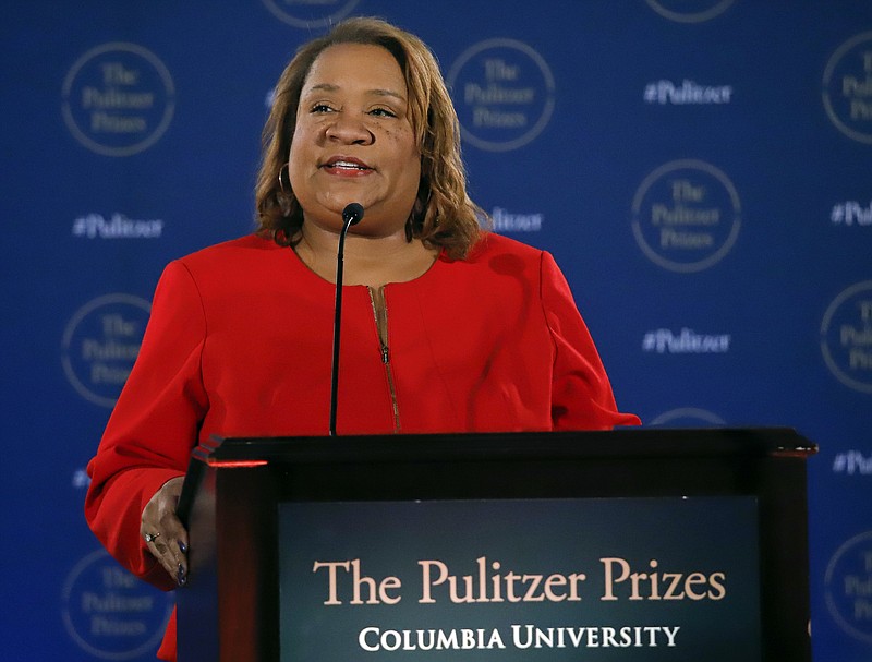 Dana Canedy, the new administrator of The Pulitzer Prizes, announces the 2018 winners, Monday April 16, 2018, at Columbia University in New York. (AP Photo/Bebeto Matthews)