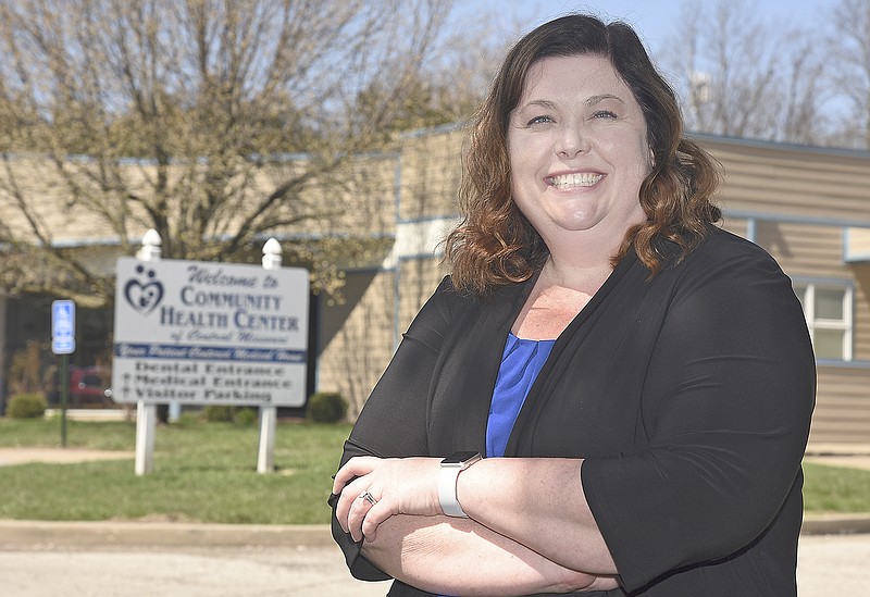 Crystal Sullivan poses outside the current location of the Community Health Center on Truman Boulevard. Sullivan is a doctor who serves as the director of the medical side of the health center but is still able to practice medicine 2 1/2 days a week.