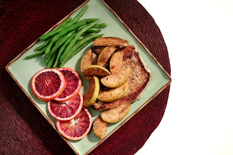 Cinnamon-Apple Pork Chop photographed in the St. Louis Post-Dispatch photo studio on Wednesday, March 21, 2018, in St. Louis, Mo. (Nikos Frazier/St. Louis Post-Dispatch/TNS)