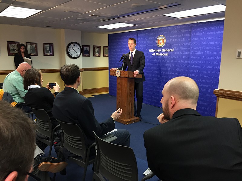 Missouri Attorney General Josh Hawley speaks to reporters during a news conference Tuesday, April 17, 2018.