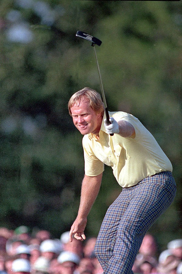 In this April 13, 1986, file photo, Jack Nicklaus watches his shot go for a birdie on the 17th green at the Masters in Augusta, Ga. Curtis Strange said every player who finished stayed in the locker room to watch the 46-year-old Nicklaus win his 18th major.