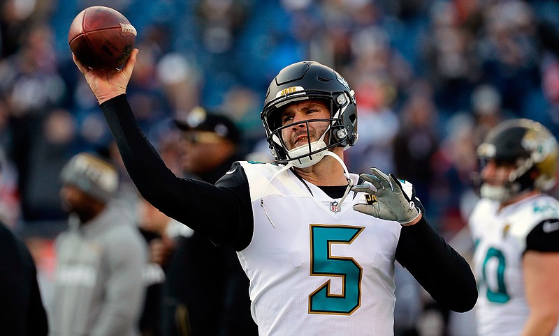 In this Jan. 21, 2018 file photo, Jacksonville Jaguars quarterback Blake Bortles (5) warms up before the AFC championship NFL football game against the New England Patriots in Foxborough, Mass. The Jaguars began their offseason program still thinking about how close they came to upsetting New England and getting to the Super Bowl. Jacksonville led 20-10 early in the fourth quarter before faltering. Players say the 24-20 loss still stings and will serve as a driving force over the next nine months. Bortles says there's "a hunger to reach that final game and go win it."   (AP Photo/David J. Phillip, file)