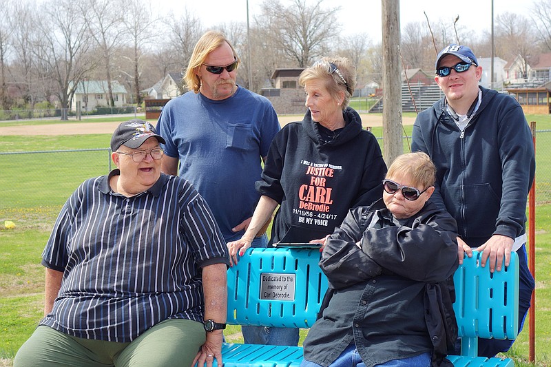 Members of the late Carl DeBrodie's family got together Saturday, April 21, 2018, just over a year after he was reported missing, to remember happier times. His former legal guardians, Bryan, back left, and Mary Martin, attended, along with his brother Nicolas Clark, stepfather Larry Summers, front left, mother Carolyn Summers and numerous aunts, uncles and cousins.
