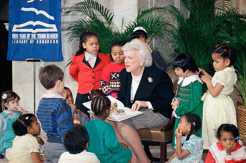 First lady Barbara Bush reads to a group of day care students on March 7, 1989, at the Library of Congress in Washington, celebrating "1989—Year of the Young Reader." In March 1989, just weeks after moving into the White House, Mrs. Bush founded the Barbara Bush Foundation for Family Literacy. It has since raised more than $110 million to create or support literacy programs for men, women and children nationwide. She remained active with the group until mere months before her death.