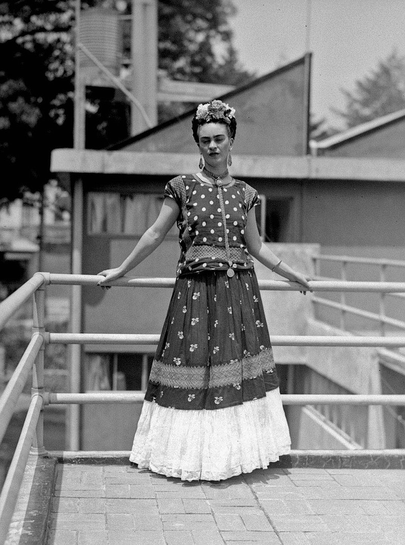 In this April 14, 1939, file photo, painter and surrealist Frida Kahlo, who was the wife of
noted Mexican muralist Diego Rivera, poses at her home in Mexico City. Distant relatives of
the late Mexican artist Frida Kahlo have won a temporary injunction on Thursday that stops
sales of a Frida Barbie doll.