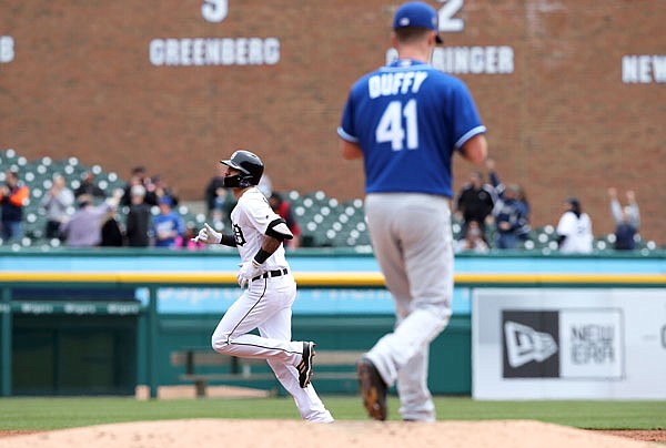 Royals starting pitcher Danny Duffy walks on the mound as Tigers right fielder Nicholas Castellanos rounds the bases after a two-run home run during the third inning of Saturday's game in Detroit.