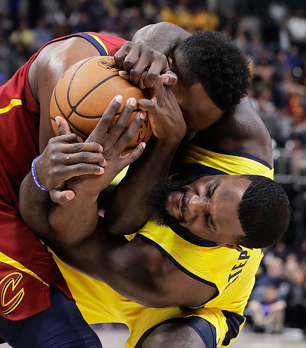 Lance Stephenson (1) of the Pacers fouls Jeff Green of the Cavaliers during the second half Sunday in Game 4 of a first-round playoff series in Indianapolis. Cleveland won 104-100.