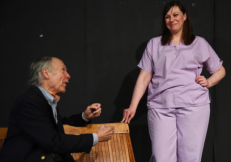 Emil Lippe/News Tribune
Stuart Massengale, played by Dick Dalton, flirts with Nurse Stephanie Hall, played by Tammy Acosta, during a rehearsal of “Bygone Days” at Scene One Theatre on Monday, April 23, 2018. “Bygone Days” was written by local Jefferson City playwright Keith Enloe.