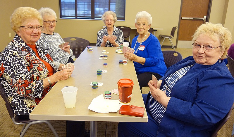 A challenging game of Michigan rummy, also known as Boodle, was enjoyed by a group of women at Monday's hospital auxiliary card game event. 