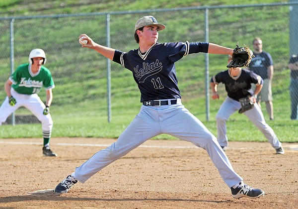 Helias pitcher Connor McKenna throws a pitch to the plate during Tuesday's game against Blair Oaks at the Falcon Athletic Complex. McKenna tossed a five-hit shutout in a 4-0 Helias win.