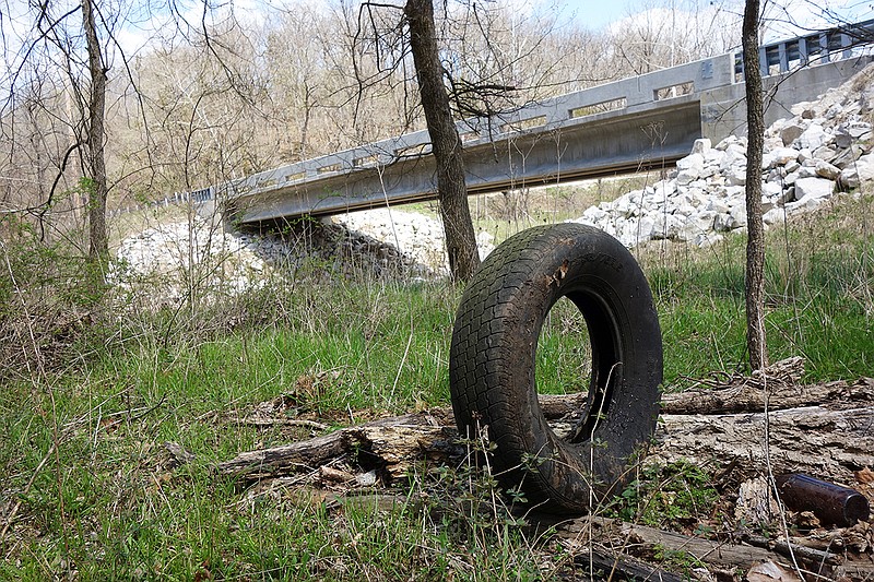 A tires sits along Old U.S. 54 between New Bloomfield and Fulton. This weekend, Callaway County residents are invited to help pick up trash along county roads. Pick up bags at the county courthouse. Interested residents should visit the commissioners county courthouse in Fulton to pick up yellow trash bags and note which road or roads they plan on cleaning. 