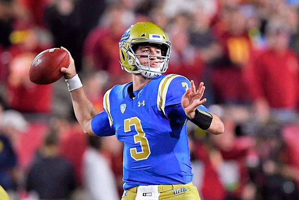 In this Nov. 18, 2017, file photo, UCLA quarterback Josh Rosen passes during the first half of a game against Southern California in Los Angeles. Every quarterback prospect in the upcoming NFL draft has a major flaw or drawback that keeps them from being the consensus best one of the bunch.