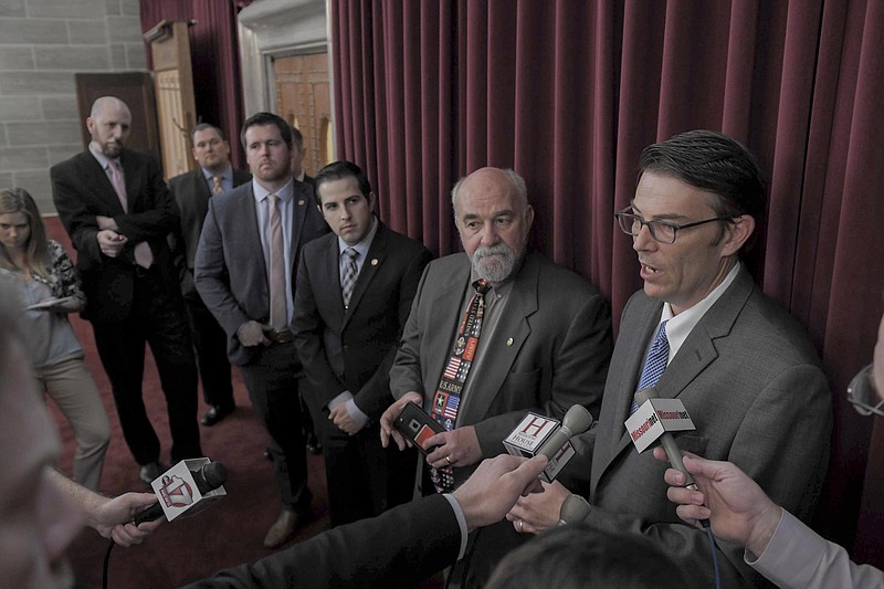 From left, House President Pro Tem Elijah Haahr, Budget Chairman Scott Fitzpatrick, state Rep. Phil Christofanelli, state Rep. Jim Neely and House Speaker Todd Richardson speak with members of the media during a news conference Thursday, April 26, 2018.