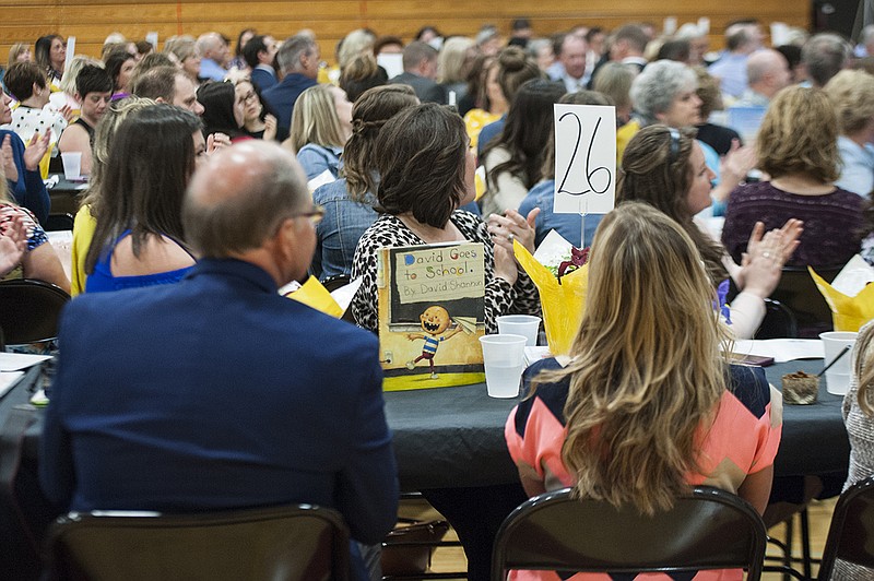 Books sponsored by Scholastic Inc. were part of the table decorations at the Jefferson City Public Schools 2018 Teacher Appreciation Banquet on Thursday, April 26, 2018, at Lewis and Clark Middle School. Teachers were able to take the books at the end of the banquet. 
