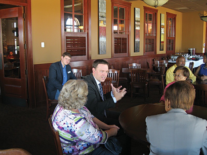 Arkansas Democratic gubernatorial candidate Jared Henderson speaks Sunday afternoon to a group of area residents at Cafe 511 in Texarkana, Ark. 