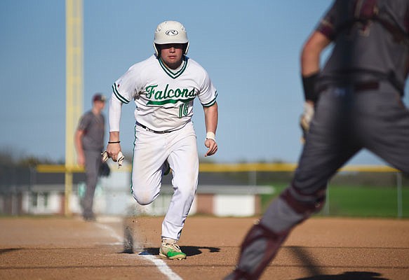 Bryce Kempker of Blair Oaks races to home plate to score a run during Monday's game against the Eldon Mustangs at the Falcon Athletic Complex in Wardsville.