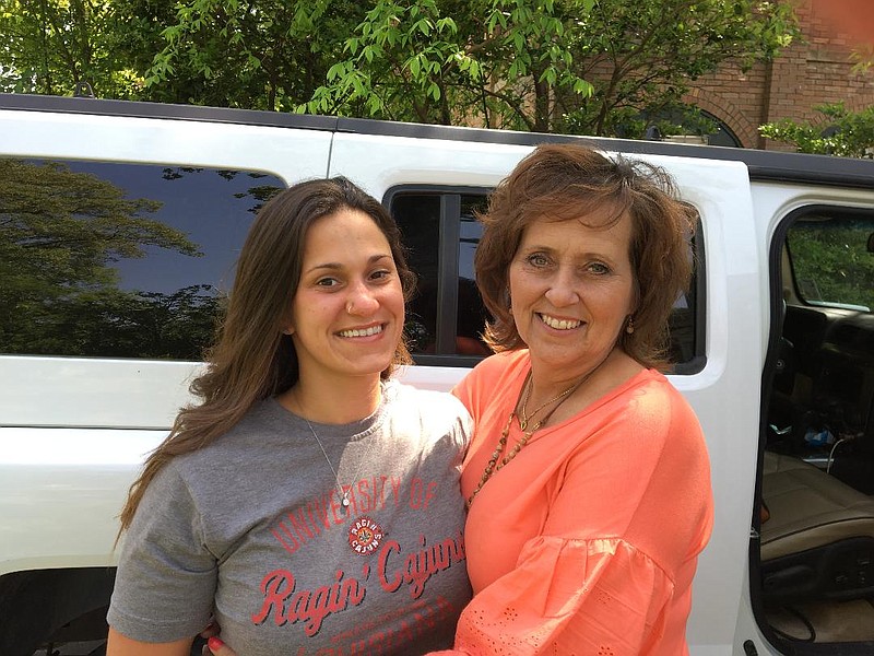 This April 2018 photo shows Tiffany Lorance, left, and her adoptive mother, Nelwyn Miller. In 2004 at age 14, Tiffany Lorance accused her adoptive father and Miller's ex-husband Robert Lorance of sexual and physical abuse starting when she was 6. Robert Lorance now serves as mayor of Redwater, Texas.