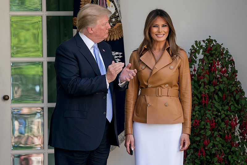 President Donald Trump and first lady Melania Trump stand together following Melania's "Be Best" event in the Rose Garden of the White House, Monday, May 7, 2018, in Washington. Sixteen months into the president's term, Melania Trump unveils plans for her initiatives to improve the well-being of children. (AP Photo/Andrew Harnik)