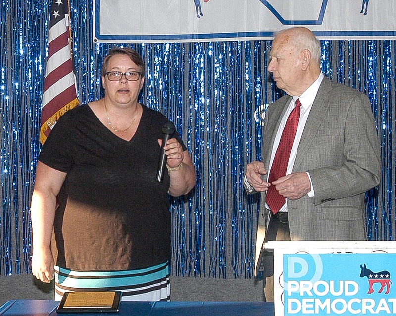 Taunia Adams, left, is named to the Moniteau County Democratic Hall of Fame by moderator Gail Hughes. Hughes said the award was overdue and a lot of the reasons for the award had to do with Adams being the person that kept the Truman Day event going.