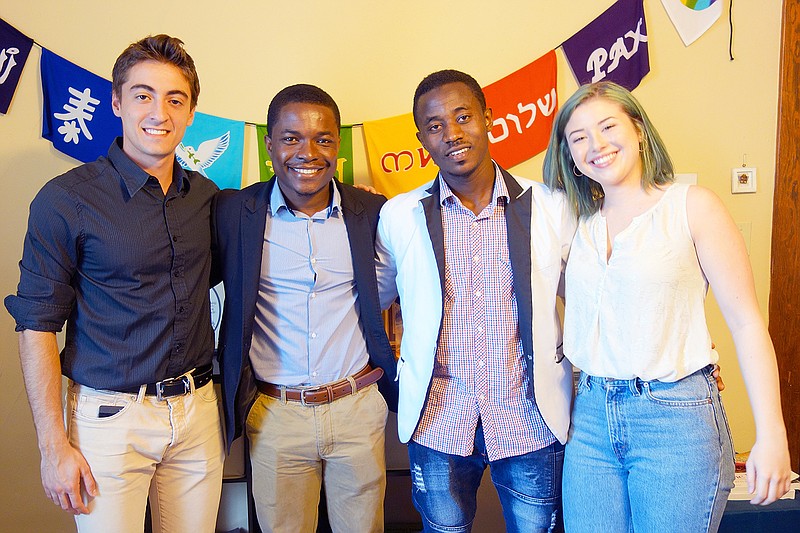 This team of four Westminster College students will travel to Uganda this summer to start a preschool. Nicolas Lopez, left, Joseph Opoku and Madi Loescher, right, will be led by Jephte Ngendo, who started a preschool in the refugee camp where he grew up.