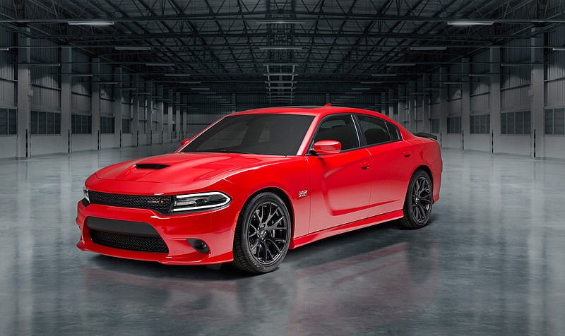 This photo provided by Fiat Chrysler shows the 2018 Dodge Charger, an example of a full-size sedan that can be a less expensive alternative to a Dodge Durango SUV. (Courtesy of Fiat Chrysler Automobiles via AP)