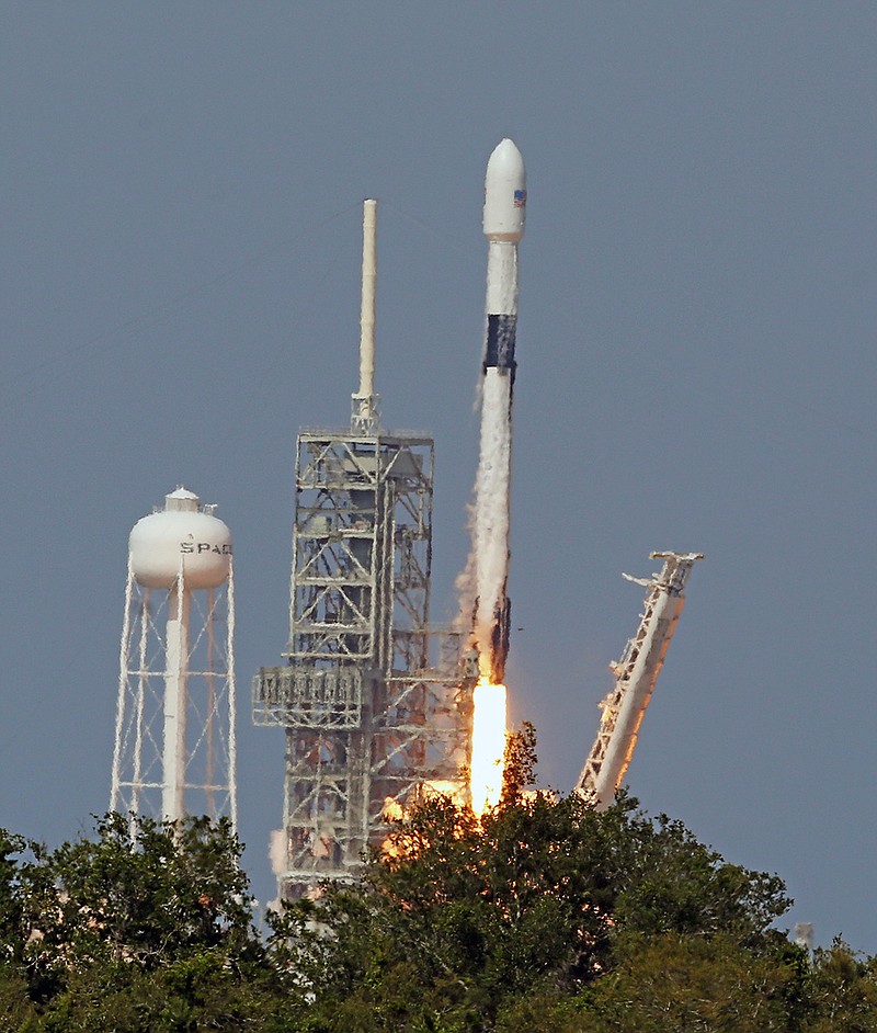 An upgraded version of the SpaceX Falcon 9 Block 5 rocket lifts off Friday, May 11, 2018, from launch pad 39A at the Kennedy Space Center carrying Bangladesh's first communications satellite. The $250 million satellite, the nation's first, is designed to improve television, telephone, data, Internet and emergency communications for Bangladesh. (Red Huber /Orlando Sentinel via AP)