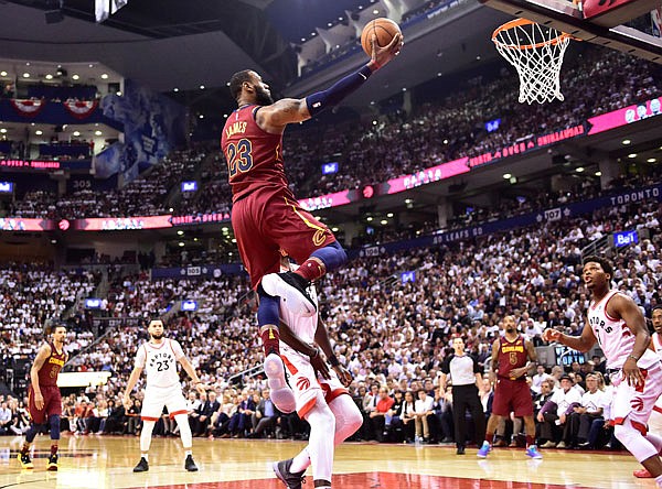 Cavaliers forward LeBron James shoots against the Raptors during the second half of game earlier this month during the NBA Eastern Conference semifinals in Toronto.