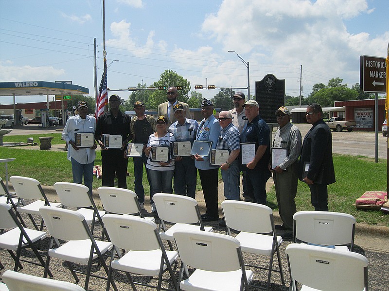 Nine DeKalb, Texas, area Vietnam veterans received U.S. Department of Defense Vietnam War Commendation Award collar pins and certificates during an awards ceremony Saturday at Veterans Triangle Park in DeKalb. 