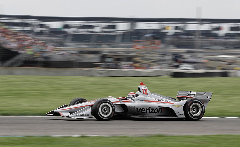 Will Power, of Australia, drives his car during the IndyCar Grand Prix auto race Sunday at Indianapolis Motor Speedway in Indianapolis.