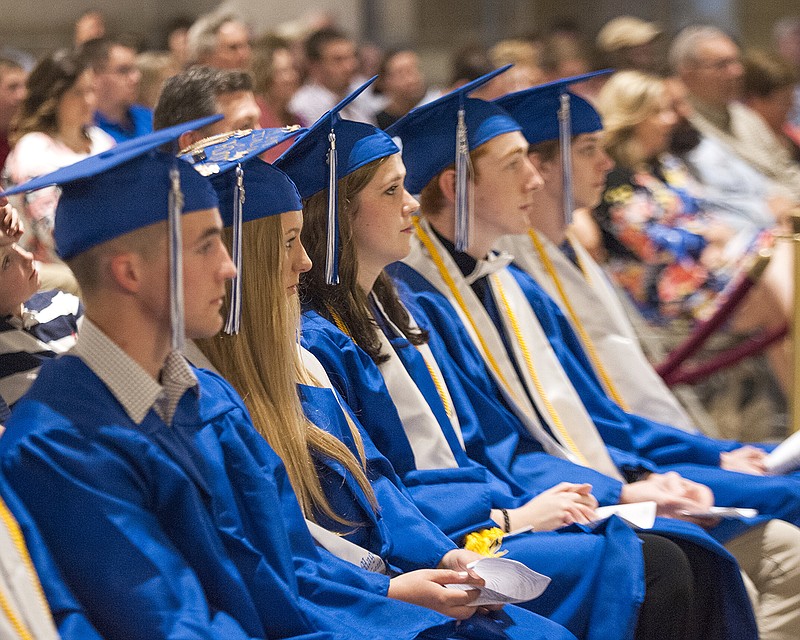 From left, Grant Broeker, Savannah Burgess, Anna Deutsch, Larry Hart and Simon Herndon listen Sunday as State Rep. Jay Barnes gives the charge to the Lighthouse Preparatory Academy class of 2018 during the graduation ceremony in the Missouri Capitol Rotunda. 