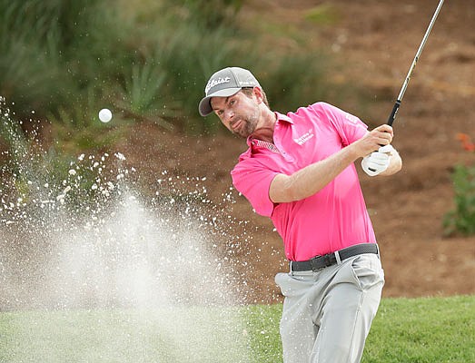 Webb Simpson hits from a bunker on the eighth hole Sunday during the final round of the The Players Championship in Ponte Vedra Beach, Fla.