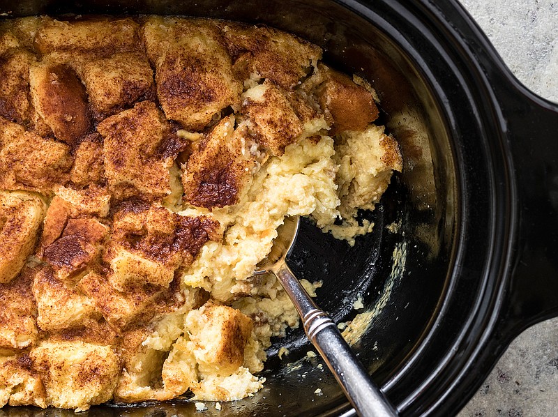 This undated photo provided by America's Test Kitchen shows Classic Bread Pudding in Brookline, Mass. This recipe appears in "The Complete Slow Cooker." (Daniel J. van Ackere/America's Test Kitchen via AP)