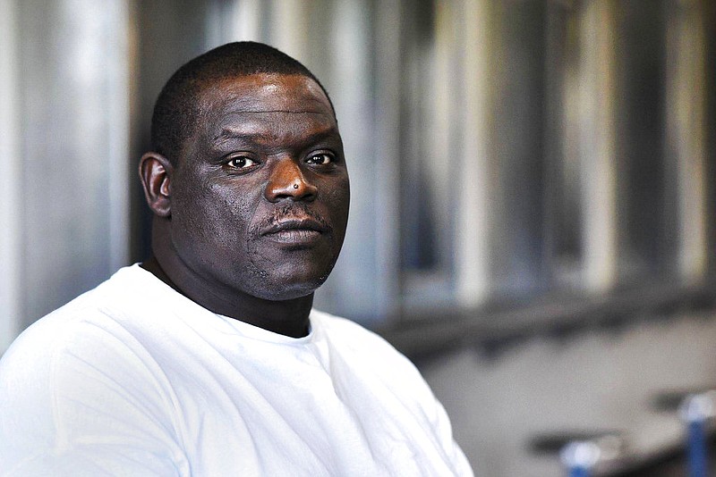 In this September 2016 file photo, prisoner David Robinson poses for a portrait in the visiting area inside Jefferson City Correctional Center in Jefferson City, Mo. Missouri Attorney General Josh Hawley is recommending that charges be dismissed against Roberson, who has served nearly 20 years in prison for the death of a southeast Missouri woman. Hawley announced Monday, May, 14, 2018, that his office is recommending Robinson, be released from prison. Robinson has been in prison since 2001 for the killing of Sheila Box, who was shot to death after leaving a Sikeston bar.