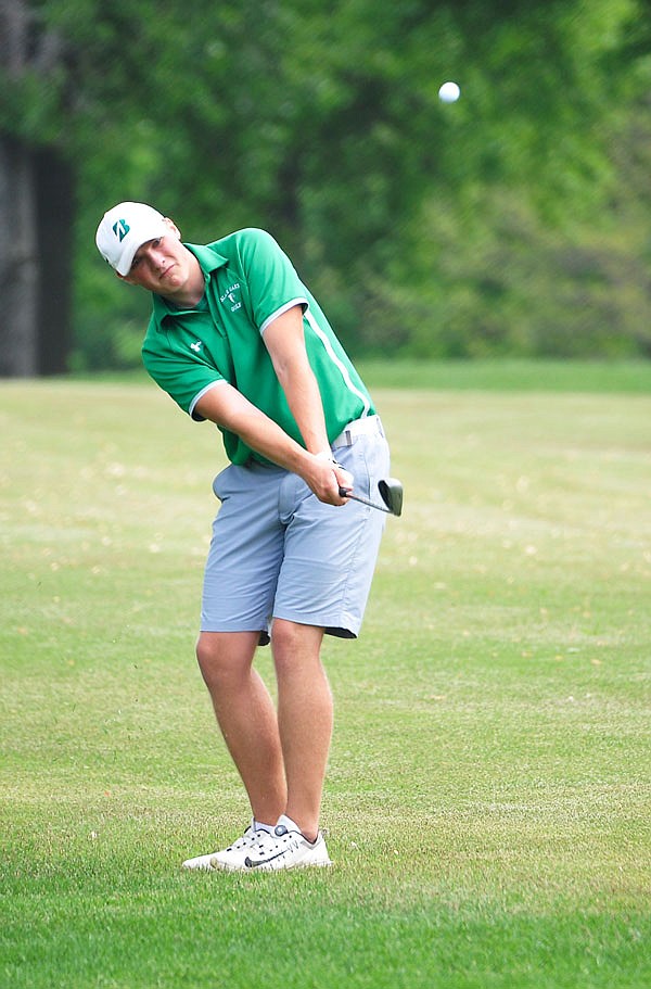 Jarod Steinbeck of Blair Oaks chips on the 13th hole Monday in the Class 2 state golf championships at Meadow Lake Acres Country Club.