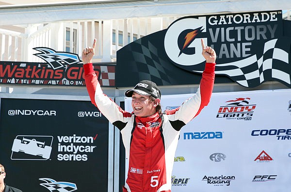 In this Sept. 3, 2016, file photo, Zach Veach celebrates in victory lane after winning an Indy Lights race at The Glen in Watkins Glen, N.Y.