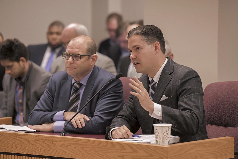 Attorneys representing Gov. Eric Greitens speak Wednesday to members of the House Special Investigative Committee on Oversight during a meeting.