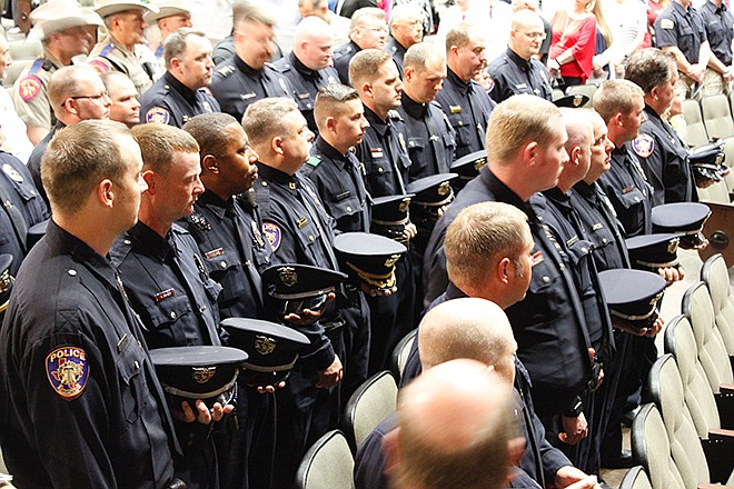 Texarkana, Texas, Police Department officers and other law enforcement personnel attend the department's 10th annual Texas Peace Officer Memorial Ceremony on Wednesday, May 16, 2018, at the Sullivan Performing Arts Center in Texarkana, Texas.