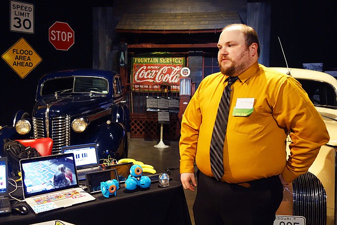 Joshua Howard, instructional technology facilitator at Fulton Public Schools, shows off the tech he acquired using a Fulton Public Schools Foundation grant during the latest FPSF gala. In 2018-19, he and two teachers are using another grant to teach students about broadcast journalism and filmmaking.