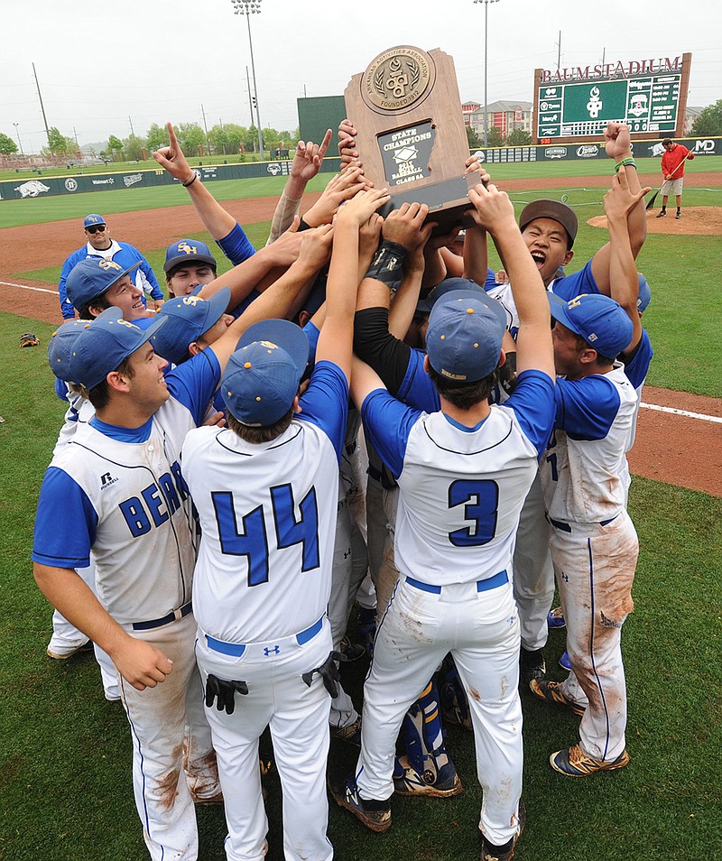 Spring Hill players celebrate a 5-0 victory over Conway St. Joseph to capture the school's first Class 2A state baseball championship in spring 2017 at Baum Stadium in Fayetteville, Ark. (NWA Democrat-Gazette)