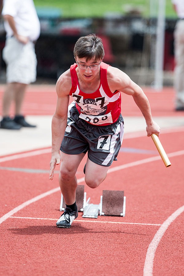 Sam Felger of Calvary Lutheran leaves the blocks to start the 4x100-meter relay at last year's Class 1 state track and field championships at Adkins Stadium.