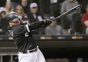 Chicago White Sox's Welington Castillo hits two-run single against the Texas Rangers during the eighth inning of a baseball game Thursday, May 17, 2018, in Chicago. 