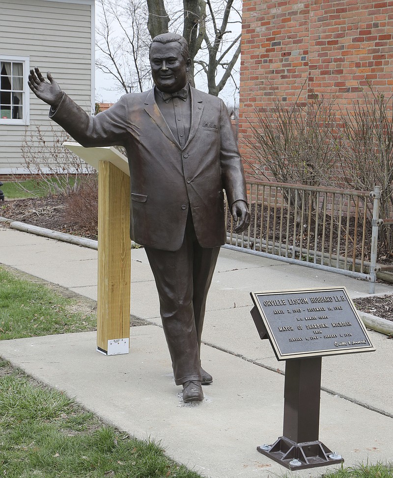 In a photo from, Friday, April 27, 2018, a statue of former Mayor Orville Hubbard, who spent decades trying to keep the city all white, is displayed in Dearborn, Mich. The statue was socked away for more than a year after leaders decided it didn't belong outside a new City Hall. Vestiges of racism and intolerance are slowly being moved and removed in Michigan and other northern states as calls continue in the South to take down such monuments. (AP Photo/Carlos Osorio)