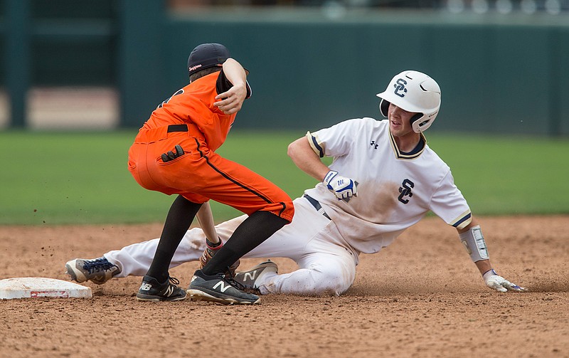 Garrett Lance, Nashville second baseman, tags out Michael Connolly of Shiloh Christian at second for a double play in the 6th inning Saturday, May 19, 2018, during the class 4A baseball state championship at Baum Stadium. Nashville won 4-0. (NWA Democrat-Gazette/BEN GOFF @NWABENGOFF)
