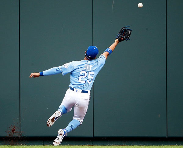 Royals center fielder Jon Jay cannot get his glove on an RBI triple hit by Aaron Hicks of the Yankees during the fifth inning of Sunday afternoon's game in Kansas City. The Yankees beat the Royals 10-1 to win their eighth straight series.