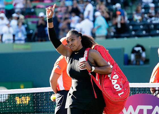 In this March 21 file photo, Serena Williams walks off the court after losing to Naomi Osaka at the Miami Open in Key Biscayne, Fla.  Williams will not be seeded in the upcoming French Open.