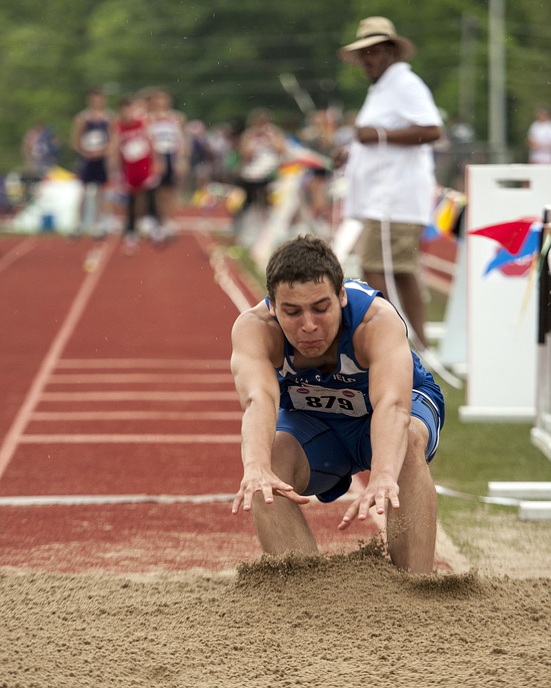 Trenton Barbour of Jamestown lands in the pit, during the Class 1 boys triple jump competition May 19, 2018, at Adkins Stadium in Jefferson City.