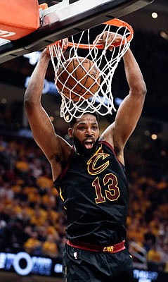 Tristan Thompson of the Cavaliers slams home a dunk during the first half of Monday night's game against the Celtics in Cleveland.