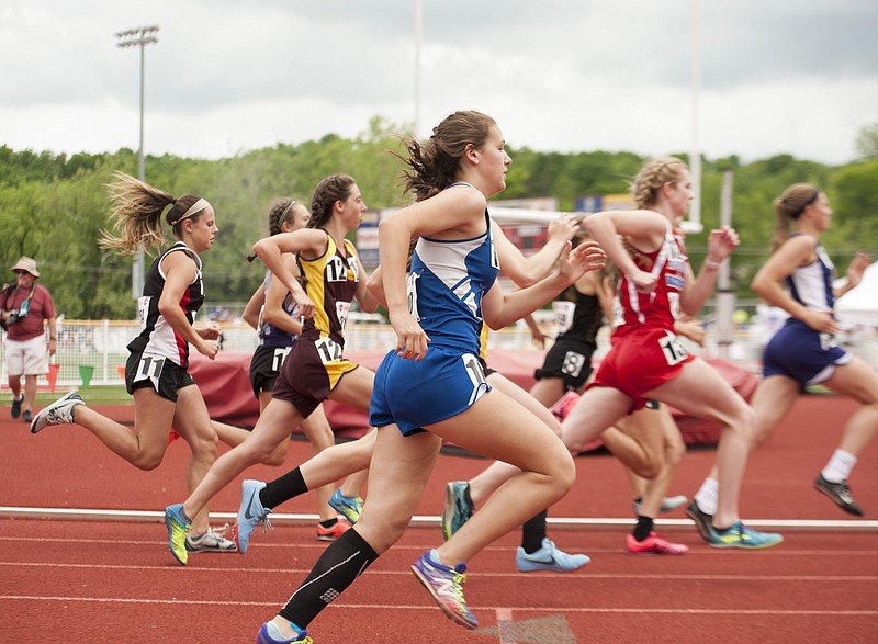 
Brooke Viox, center, of Valle Catholic races for position at the start of the Class 1 Girls 800 Meter Run Finals during the Missouri State High School Activities Association Class 1 & 2 Track & Field Championships on Friday, May 18, 2018.